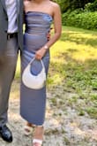 Not very comfortable. Both the skirt and the top are very limiting. Go a size up. Material gets dirty easily. After washing, it stain didn't go away. - Tania P.