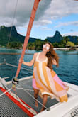 Purchased this dress for my honeymoon in Bora Bora. Absolutely loved it! I was able to dress it up with cute shoes for an evening out, and I wore it as a cover-up. Super comfortable and flowy. I have a small chest (34A) and was able to wear this dress with no bra. - Katie G.