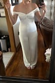 Good thick, quality material we know and love! You will have to wear nude undergarments and canNOT raise your hands above the elbow- so, be aware of that. Very beautiful piece - Deme R.