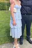 I loved this dress for my graduation. The only thing I would say is that the bust is quite tight, so keep that in mind when ordering, for sure. Other than that, I really liked it! - Ciara P.
