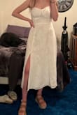 I love this dress; it fit perfectly and has adjustable straps. We can work with my different chest sizes - Emily B.