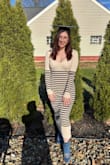 Wore this to my fall graduation and many other events! It's super comfy and stretchy! If you're in between small and medium, def go small!! - Reg C.