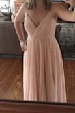 It's a beautiful dress, and would work well as a bridesmaid dress! However, the Large that I ordered was too big for my smaller chest. Fits well everywhere else. Excellent quality! - Amy T.