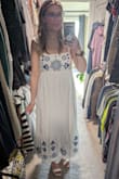 I saw this dress online and instantly fell in love with it! I purchased it for my bridal shower and originally ordered a medium. While the bottom fit beautifully and had a nice, flowy look, the top was too large, so I exchanged it for a small. The small fit better overall, but I still had some trouble with the straps; they were too long and kept slipping off my shoulders, so I found myself adjusting the top throughout the day.
With sizing down, the fit on my lower half was a bit snug, especially in the underskirt, but it wasn't uncomfortable, just more fitted than the medium. I do wish the small had the same flowy feel on the bottom as the medium did, but overall, the dress was still beautiful and perfect for the occasion! I received so many compliments, and the quality of the material was fabulous. It had a nice weight to it, but was surprisingly breathable! - Taylor S.