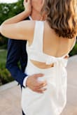 This dress is so perfect! I am very athletic shaped with no natural waistline and this actually gave the illusion of a waistline! It is short for my fellow tall girls, so recommend shorts underneath. - Madison K.