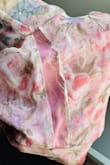 I ordered this dress two days ago, and it was delivered very quickly. However, the dress is damaged. The stitches on both sides of the top part are worn out. The quality is not worth the price tag, so I will be returning it - Pabasara S.