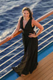 I absolutely loved this dress! I originally bought it for a Valentine's Day gala but then didn't attend, so I took it on my cruise last month for elegant night! The fit is incredibly flattering, especially the cinched waist and deep V-neckline, which gives it an elegant, yet modern silhouette. The material feels light and flowy, although the weight of the dress is a bit heavier, it's perfect for dancing or walking comfortably all night. The high slit adds just the right amount of drama without being over the top, and the black color makes it so versatile for weddings, galas, or formal events. I received tons of compliments and felt so confident wearing it. Definitely a staple piece for any formal wardrobe! - Bayleigh H.