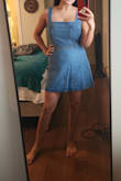 I am an apple shape & there isn't much give around the torso. I had originally gotten a small, and it wouldn't zip. I exchanged for a medium and if fit much better. I'm not wearing a bra in this photo, but there is definitely enough give in the bust to wear a push-up bra. It's definitely a fun dress, and I'm looking forward to wearing it this summer! - Maliha K.