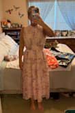 I LOVED this dress when I put it on and when ordering it was one I was not sure about.  It is so flattering.  For me, this dress was tight around the rib cage though.  I literally tried it on multiple times hoping I could get it to fit because I loved it so much.  I have an athletic fit so if you are the same I would order a size up.  Would recommend though as it is beautiful in person!! - Sherri C.