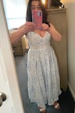 I'm so glad I ordered this dress. We're planning a city weekend getaway for my husband's milestone birthday and this dress is a keeper!
I was somewhat skeptical because I'm 62 years old, short (5'1"), with a 34DD chest and narrow shoulders and back. The dress sits perfectly on me, and the adjustable straps help to make it an alluringly but classy look.
The dress is made well, with a soft cotton material. While the material is not stretchy, the dress is fully and comfortably lined. I love the touch of blue embroidered stitching. It's a flawlessly elegant look.
I'm normally a size 8 petite, and the medium was a great fit for me. - Lucille S.