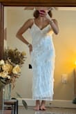 I bought it for my grad and I loved it! I'm not sure if I will be using it as it feels a little loose on the side where the zipper ends. Anyway, thinking of tailoring that and wearing it later. Best white dress, comfy and very sweet, and fashionable. - Rafaella C.