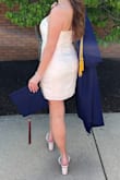 This is one of my favorite dresses I have ever owned! It seriously fit perfectly and was so flattering. Definitely a perfect length too because it hit right at mid-thigh! Such beautiful detail and love the slit. - Anna V.