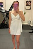 I ordered this for my getting ready outfit on my wedding by day. It runs a little big, enough so that I could have gotten an XS. I was expecting the cups to have a little padding to them, but it's just a lining. Either way, it's cute and I'll keep it! - Ashley G.