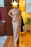 I wore this to a spring fundraising gala.  It was right on theme!  The dress is fully sequined and has some weight to it.  For a strapless dress, the dress stayed up very well, while using a strapless bra. I used it for 5" platforms, given my height, and the dress was right at ground level. - Ella F.