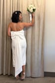 This dress was perfect for my civil wedding. I love it! The bow in the back was perfect. Very elegant - Tannia C.