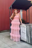 I got so many compliments on this dress! It was very figure-flattering and hid a lot. I bought this for my niece's wedding to match the wedding colors. I have had 4 kids and I'm 48. I got so many compliments on this dress. - Tiffany T.