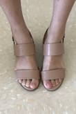 I love the look of these sandals, so versatile and would go with anything. Sizing wise the bed of the shoe fits perfectly, but the top strap is a little tight at the back edge so it digs into my foot. I'm still going to keep them and hoping that it's going to stretch out more with time. - Wendan L.