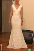 Ordered this dress as a potential wedding dress. Absolutely LOVED the open back, and it makes your butt look amazing. However the front is kind of lackluster, wish the straps were thinner. Fit is perfect, just a tiny little bit long even with heels. The quality is wonderful as always with Lulu's. - Wendan L.