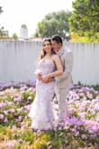 This dress is beautiful. I wore it for my engagement shoot and got so many compliments. My only issue was that it was a bit tight around my hips. Other than that, it was perfect! - Christine R.