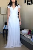 Ordered this dress as a potential wedding dress but it was a little too casual for me. Also the waist was too small on this dress when I'm a perfect XS in all other Lulu's dresses, but I could not zip this one up all the way (see photo). The skirt falls very nicely though and overall it's a very pretty dress. - Wendan L.
