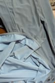 The lining of the dress is a gorgeous light blue. The out lining is more of a dingy blue. I returned for that reason alone. It fit perfectly. - Heather D.