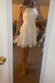 I got this for my graduation and it was perfect. It was really hot and the backless part helped keep me from overheating. It was flowy and photographed really well. Not see through at all. - Karen V.