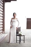 To those who are eyeing this dress, girl get it! It's beautiful and I'm 5'5 and weigh 118 to 120 and I got XS size and it's perfect like a glove. I got compliments with this dress, it's perfectly made. I wore on my beach wedding and it's also comfortable. Some reviews said it limits your movement on your shoulders, but mine is just fine - Ailyn P.