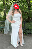 I loved the dress. It fit perfect. Very stretchy. The split and the pearls made the dress even more beautiful. Everyone complimented my dress. It was perfect for my wedding. - Stephanie C.
