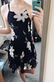 This dress is so cute. Probably better for people with small busts because it is quite tight in the top half. Other than that, it fits perfectly and is long enough to cover my bottom which is sometimes hard to find. - Brandi H.