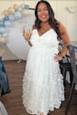 I wore this dress to my bridal shower and absolutely loved it. I felt like a total princess. It's even more stunning in person, and I got so many compliments! The adjustable straps were a great touch for getting the perfect fit. Highly recommend for any bride-to-be or special occasion! - Nidia P.