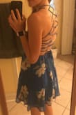 This dress is adorable. Good quality fabric and nicely made. I was skeptical at first but read the reviews and I ended ordering a medium and it fits perfectly. I have a boxy shape and am pretty flat chested so I am able to go without a bra while wearing the dress with no worry when I get cold! The straps in the back can adjust a little bit to give room for bigger boobs. - Michelle H.