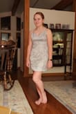 This beautiful, blingy floral dress is a perfect dress-up semi-formal choice in elegant silver.  Decent coverage and fits true to size.  Gorgeous choice. - Claire Z.