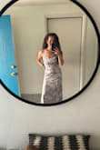 This dress is beautiful and comfortable. The slit came up a little high when seated but I don't mind that. - Samantha E.