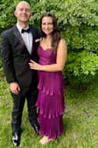 I am obsessed with the purple color! I received tons of compliments in this dress.  Since I'm short, the dress hit at my ankle, but I was fine with that and it worked perfect for a cocktail/formal wedding. My only issue I had was the way it fit up top. It fit great everywhere but boob area was a little weird. It gapped it the boob area, but if I was much bigger in the chest area it would be too tight. Other than that, I loved this dress! - Sara F.