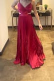 The dress in absolutely beautiful; that color is gorgeous! Love it - Lourdes E.