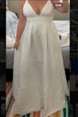 Nice material, thicker fabric than I thought. The fit was very nice but I don't like the amount of cleavage shown in the dress for myself. The silhouette is flattering - Katrina P.