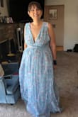 I sized up based on others' comments about it running a size or two too small. I probably would be a L or XL normally, so I went up to a XXL. I'm so glad I did! It's a little loose in the bust, so I'll need to take that in, but the empire waist is exactly the right size, which tells me it does indeed run small. I used to be a professional seamstress and always told people to get a dress to fit the widest part, and alter alter alter. (Photo was right after it arrived. The event is still 2 months off so this is before alterations.) - Erin A.