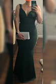 I was looking for a dress to wear to a summer wedding, and this emerald green one completely exceeded my expectations. The color is beautiful and even better in person. The open back adds just the right touch of elegance and drama without being too revealing. I have an hourglass figure, and the fit hugged my curves in all the right places without clinging uncomfortably. The fabric has a nice weight to it and moves well when walking or dancing. Keep in mind that it's backless, so you'll need adhesive cups or a sticky bra, but it's 100% worth it. I got so many compliments! - Virginia T.