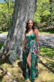 This dress is absolutely gorgeous!!! The color!! The style!!!
It was long but that's because I really don't like to wear high heels. I did get it tailored and made it shorter and also I made the cut a little higher!!!! Everyone complimented my dress!!! - Mirvat F.