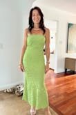I got a lot of compliments for this dress, it's perfect for a summer wedding as a guest. Fits true to size, I'm wearing an extra small here, I think I would have preferred a small, but that size was sold out - but it worked out ok. The color is amazing! Quality is good, there's a built in slip underneath which I really liked. - Diana S.