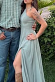 I'm a petite girl, and I decided to go with a size small, and it did not disappoint. The top half of the dress was a bit loose at first, but the adjustable straps helped to adjust it. The length of the dress didn't matter because I paired it with cowboy boots that had a bit of a heel. - Fiona R.