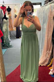 It fit very nicely, and I got so many compliments on the color and the tie straps.  I did have to get it hemmed, but overall it was a great dress and would definitely recommend! - Kristen M.