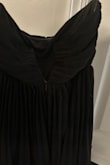 I purchased this dress for my 17yo daughter. It was beautiful. We had a real issue w the zipper. Once you unzipped it. Tried it on- tried to zip it back up. It would only zip not even halfway. It was stuck- would not budge. We struggled big time. It was not catching on anything. We were so frustrated. We tried home remedies- dry bar soap, vaseline. etc. on the zipper-to get it to zip. So, needless to say we finally got it zipped back up w/out her in it. it took forever to get it to budge. I had to have her slide her arms through, pull it over your head. Pull it down. It took over an hour to get this situation rectified. For as much as I paid for this dress, that should not have happened. I'm including two pictures of how far it zipped up. I think I should get my $ back credited to my cc I used. Another person at the wedding, ordered a different black dress, from your company. She had the same issue w the zipper. I'm not happy about this at all! - Jennifer R.