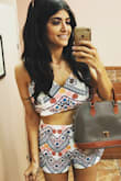 I bought this top and the matching shorts. They both fit perfectly and the pattern is so beautiful! Love it! - Logan M.