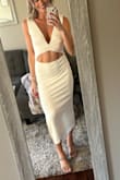 This dress was so comfortable and fun to wear. The fabric is thick and good quality. 10/10 recommend. I'm between sizes (S and M) and would have been fine in either size. - Nicole H.