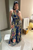 I purchased the blue floral print satin maxi dress for a quinceañera party in the Caribbean last week, and it was absolutely perfect! The dress is so beautiful and flattering, the flowy satin fabric moved beautifully and kept me cool in the warm weather. I received so many compliments throughout the night. The fit was just right, and the vibrant floral print really stands out. You simply cannot go wrong with this dress, it's elegant, comfortable, and perfect for any special occasion. Highly recommend! I purchased a size L. - Patricia M.