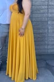 I have worn this dress to two weddings and have loved wearing it both times! I received so many compliments on the style/color/fit which is a big deal to me as a "curvier" woman. I had to get it hemmed and my bust was a little bigger than I think the dress was meant for but it still worked well and the adjustable straps held up very well (I had concerns and packed safety pins just in case). - Cristel O.