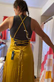 I ordered a large. My daughter, who weighs 125lbs 5foot 2 in, and has a 26-inch waist, could fit in the dress. The top was too large, but the waist fit her well. - Lara O.