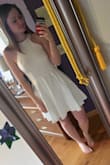This is the best dress EVER! I have never tried on a dress that I ordered online and absolutely fell in love like I did with this one. Very flattering fit, and extremely comfortable because of the soft material. White not see through at all either! Perk, no bra needed, just pedals or something! If you're thinking about buying it, think no further - it's perfect.
For your info, I ordered a small. - Christa S.