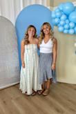 My daughter wore this to her sister's grad party. Light, almost linen material. Beautiful drape.Very flattering. True to size. Washes well. - Natalie B.
